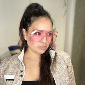 Light pink shield sunglasses with gold frame